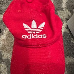 Red adidas baseball cap. Never worn.